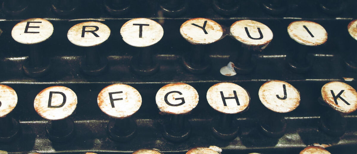 A vintage typewriter on a working editor's desk